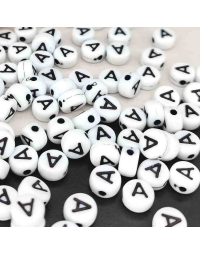 Letra negra. Moneda blanca. Vocales. 7 mm diámetro. 1,5 mm perforación. 100 uds. aproximado.