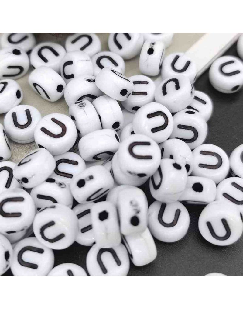 Letra negra. Moneda blanca. Vocales. 7 mm diámetro. 1,5 mm perforación. 100 uds. aproximado. Letra negra. Moneda blanca. Vocales. 7 mm diámetro. 1,5 mm perforación. 100 uds. aproximado.