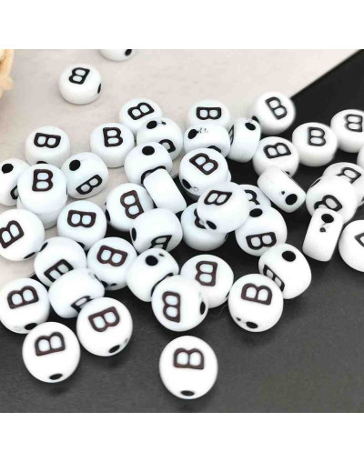 Letra negra. Moneda blanca. Letra "B". 7 mm diámetro. 1,5 mm perforación. 100 uds. aproximado.