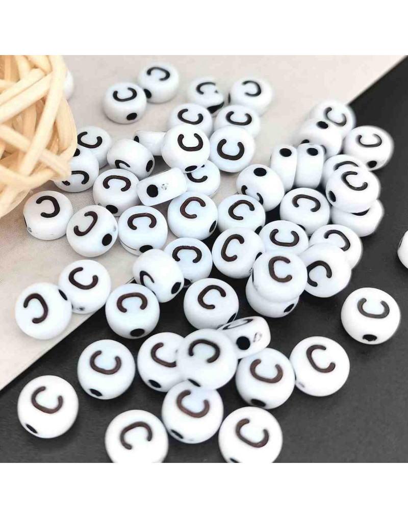 Letra negra. Moneda blanca. Letra "C". 7 mm diámetro. 1,5 mm perforación. 100 uds. aproximado. Letra negra. Moneda blanca. Letra "C". 7 mm diámetro. 1,5 mm perforación. 100 uds. aproximado.