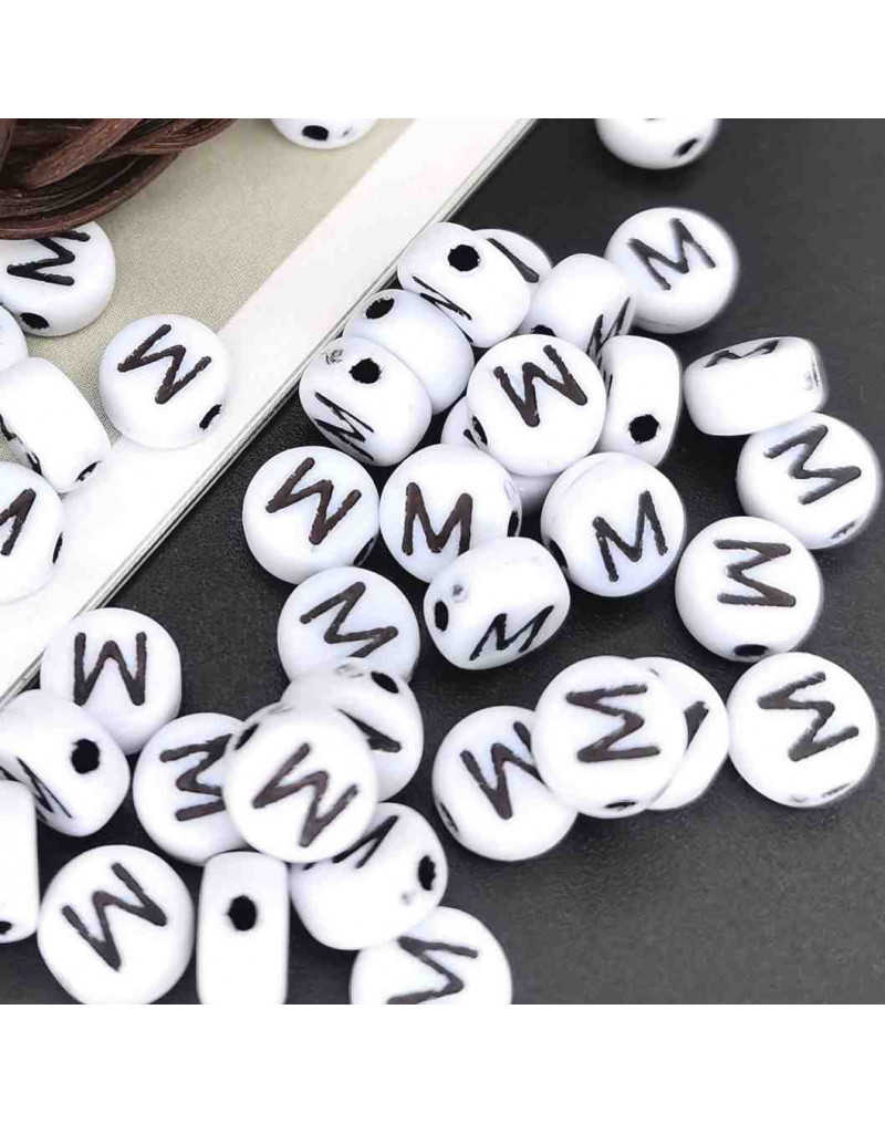 Letra negra. Moneda blanca. Letra "M". 7 mm diámetro. 1,5 mm perforación. 100 uds. aproximado. Letra negra. Moneda blanca. Letra "M". 7 mm diámetro. 1,5 mm perforación. 100 uds. aproximado.