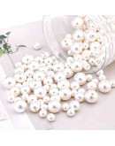 Esfera. Imitación perla. Color White. 08 mm diámetro. 2 mm perforación. 100 uds aprox. Esfera. Imitación perla. Color White. 08 mm diámetro. 2 mm perforación. 100 uds aprox.