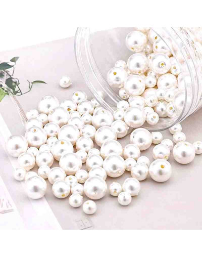 Esfera. Imitación perla. Color White. 08 mm diámetro. 2 mm perforación. 1900 uds aprox. 500 gr.