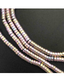 Hematite sintético. Heishi beads. Dorado Multicolor. 4x2 mm. 1 mm perforación. 200 uds hilo aprox.