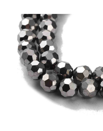 Esfera faceteada. Color plateada. 6x5 milímetros. 1 mm perforación. 100 uds hilo aprox.. 1 hilo.