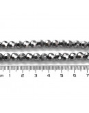 Esfera faceteada. Color plateada. 6x5 milímetros. 1 mm perforación. 100 uds hilo aprox.. 1 hilo.