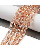 Barril faceteado. Orange Full Rainbow Plated. 6x4 mm. 1 mm perforación. 65 uds hilo aprox. 1 hilo