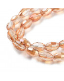 Barril faceteado. Orange Full Rainbow Plated. 6x4 mm. 1 mm perforación. 65 uds hilo aprox. 1 hilo