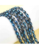 Barril faceteado. Blue Full Rainbow Plated. 6x4 mm. 1 mm perforación. 65 uds hilo aprox. 1 hilo