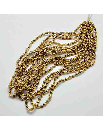 Barril faceteado. Color Gold Plated. 6x4 mm. 1 mm perforación. 65 uds hilo aprox. 1 hilo