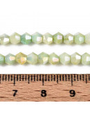 Bi-cono. Plated Pale Green. 4.2~4.9x3.9 mm. 0.8 mm perforación. 80 uds hilo aprox. 1 hilo.