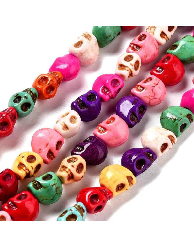 Turquesa sintética. Calavera. Color mixto. 8x6x7 mm. 1.4 mm perforación. 45 uds hilo aprox. 1 hilo.