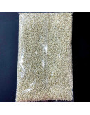 Chaquira. Color sólido. CREAM. 2 milímetros. 1 mm perforación. 40 gramos. 2600 uds aprox.