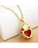 Religión: Corazón de Jesús. Aleación. Baño 18k Gold. Zirconia. 25x15 mm. 3x6 mm cierre. 1 ud.