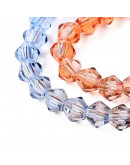 Bi-cono. Color degradado: verde a azul. 4.5x4 mm. 0.8 mm perforación. 80 uds hilo aprox.