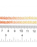 Bi-cono. Color degradado: verde a azul. 4.5x4 mm. 0.8 mm perforación. 80 uds hilo aprox.