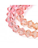 Bi-cono. Color degradado: naranja a rojo. 4.5x4 mm. 0.8 mm perforación. 80 uds hilo aprox.