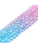 Bi-cono. Color degradado: amarillo a celeste. 4.5x4 mm. 0.8 mm perforación. 80 uds hilo aprox.