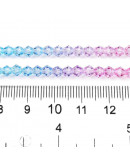 Bi-cono. Color degradado: amarillo a celeste. 4.5x4 mm. 0.8 mm perforación. 80 uds hilo aprox.