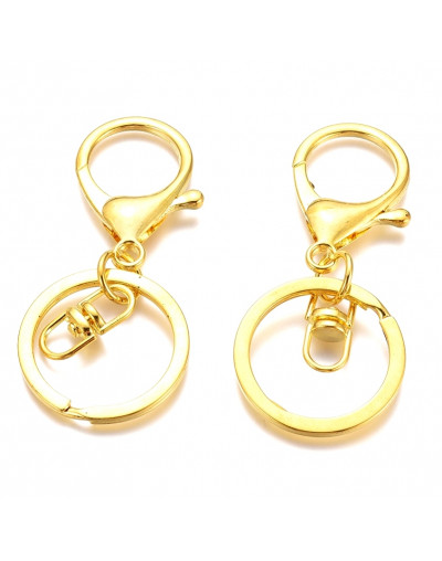 Accesorio para llavero. Aleación de cobre. Color dorado. 68x30 milímetros. 2 unidades.