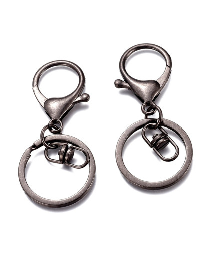 Accesorio para llavero. Aleación de cobre. Color gun metal. 68x30 milímetros. 2 unidades.