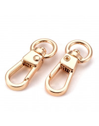 Accesorio para llavero. Aleación de cobre. Color dorado. 31x12x6 milímetros. 2 unidades.