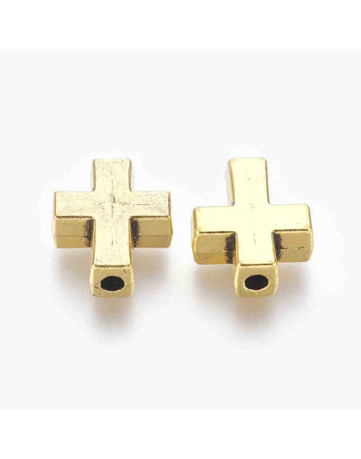 Cruz (1). Aleación de cobre. Color oro antiguo. 15x12x5 mm. 2 mm perforación. 10 unidades