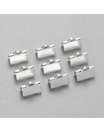 Terminales. Aleación de cobre. Color plateado. 10x7 milímetros. 2 mm perforación. 40 uds aprox.