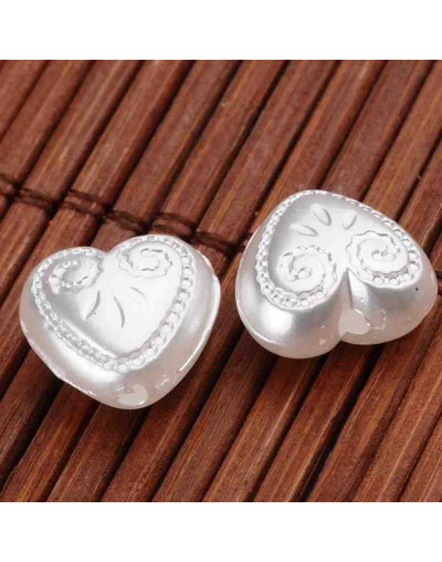 Corazón. Imitación perla. Color White. 11.5x12x6.5 mm. 1.5 mm perforación. 20 uds aprox.