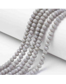 Rondelle. Faceteado. 6x5 mm. Gris. 1 mm perforación. 80 uds hilo aprox. 1 hilo.