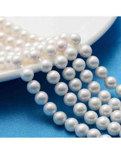 Concha de mar. Esfera color blanco. Pulido. Grado A. 6 mm. 0,5 mm perforación. 60 uds hilo aprox.