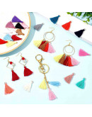 Tassel. Poliester+Aleación cobre dorado. Colores variados. 33x6 milímetros. 2.4 mm agujero. 4 uds.