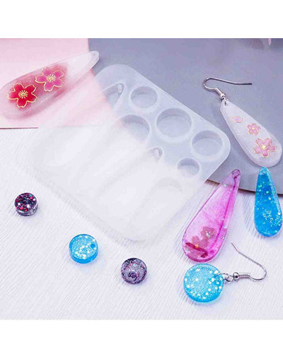 Molde para resina. Aretes. Formas moneda y gota. 65x72 milímetros. 1,5 mm perforación. 1 ud.