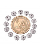 Acero inoxidable. Color plateado. Flor 8 pétalos. 7 mm diámetro. 1 mm perforación. 20 uds aprox.