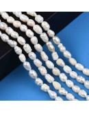 Perla natural de río. Forma irregular. Lágrima. 5~11x4.5~6 mm. 0,7 mm perforación. 43 uds hilo aprox