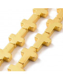 Hematite sintético. Cruz. Color dorado. 14x10x4 mm. 1 mm perforación. 1 ud.