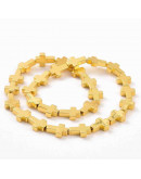 Hematite sintético. Cruz. Color dorado. 14x10x4 mm. 1 mm perforación. 1 ud.