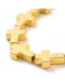 Hematite sintético. Cruz. Color dorado. 14x10x4 mm. 1 mm perforación. 1 ud.