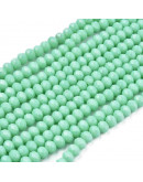 Rondelle. Faceteado. 6x5 milímetros. Verde turquesa. 1 mm perforación. 80 uds hilo aprox. 1 hilo.