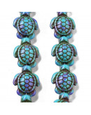 Howlite sintético. Tortugas. Color mauve. 17x14x7.5 mm. 1,6 mm perforación. 22 uds hilo aprox.