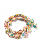 Howlite sintético. Tortugas. Colorful. 17x14x7.5 mm. 1,6 mm perforación. 22 uds hilo aprox.