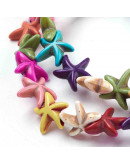 Turquesa sintética. Estrellas de mar. Colores varios. 14x14x5 mm. 1,5 mm perforación. 35 uds hilo.