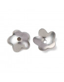 Acero inoxidable. Color plateado. 6 mm diámetro. 0,7 mm perforación. 20 uds aprox.