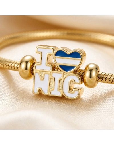 Nicaragua+Corazón. Pandora Charm. Aleación Cobre. Baño 18KGold. 15x14x8 mm.5 mm perforacion. 1 ud.