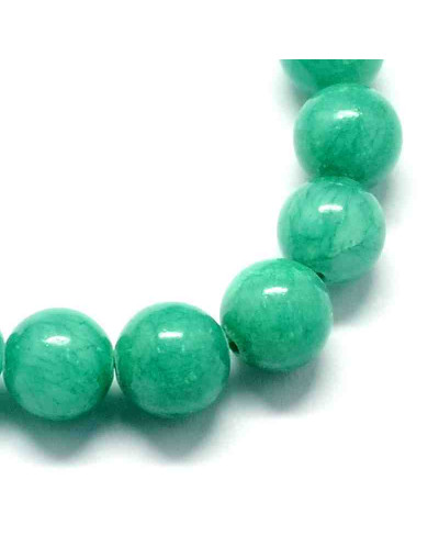 Jade. Aquamarine Teñido. 06 mm diámetro. 1 mm perforación. 60 uds hilo aprox. 1 hilo.
