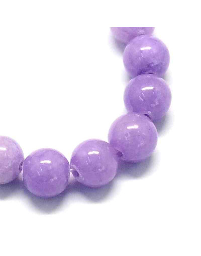 Jade. Medium Purple Teñido. 06 mm diámetro. 1 mm perforación. 60 uds hilo aprox. 1 hilo.