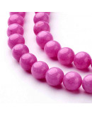 Jade Mashan. Magenta Teñido. 08 mm diámetro. 1 mm perforación. 45 uds hilo aprox. 1 hilo.