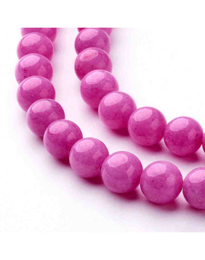 Jade Mashan. Magenta Teñido. 08 mm diámetro. 1 mm perforación. 45 uds hilo aprox. 1 hilo.