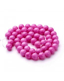 Jade Mashan. Magenta Teñido. 08 mm diámetro. 1 mm perforación. 45 uds hilo aprox. 1 hilo.