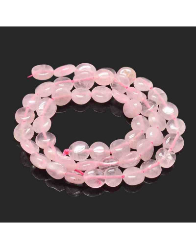 Cuarzo Rosa. Nuggets Tumbled. 5~10x6~7x3~7 mm. 1 mm perforación. 50 uds aprox. 1 hilo.